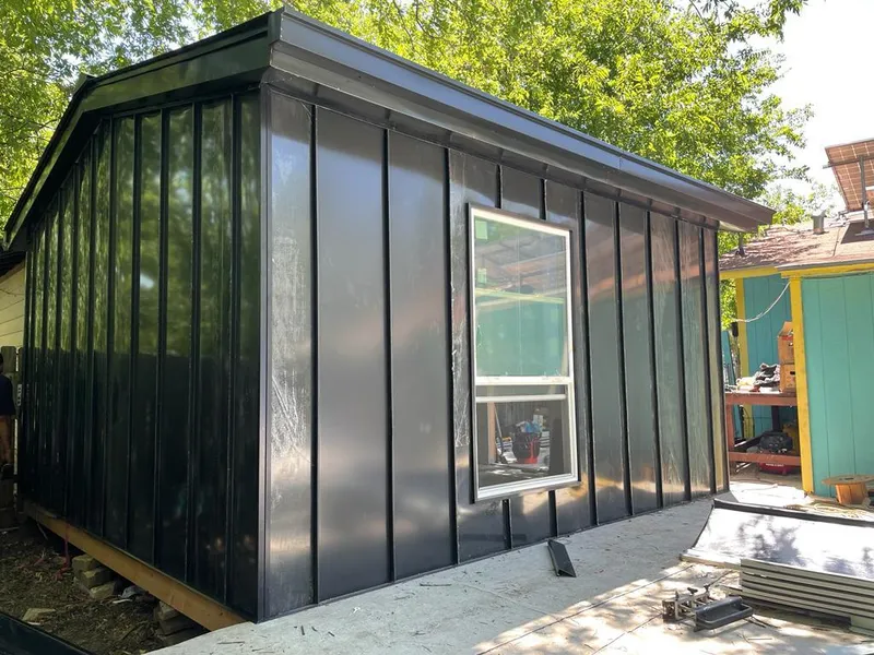 Black standing seam metal wall panels for Metal Roof Installation in Johnstown