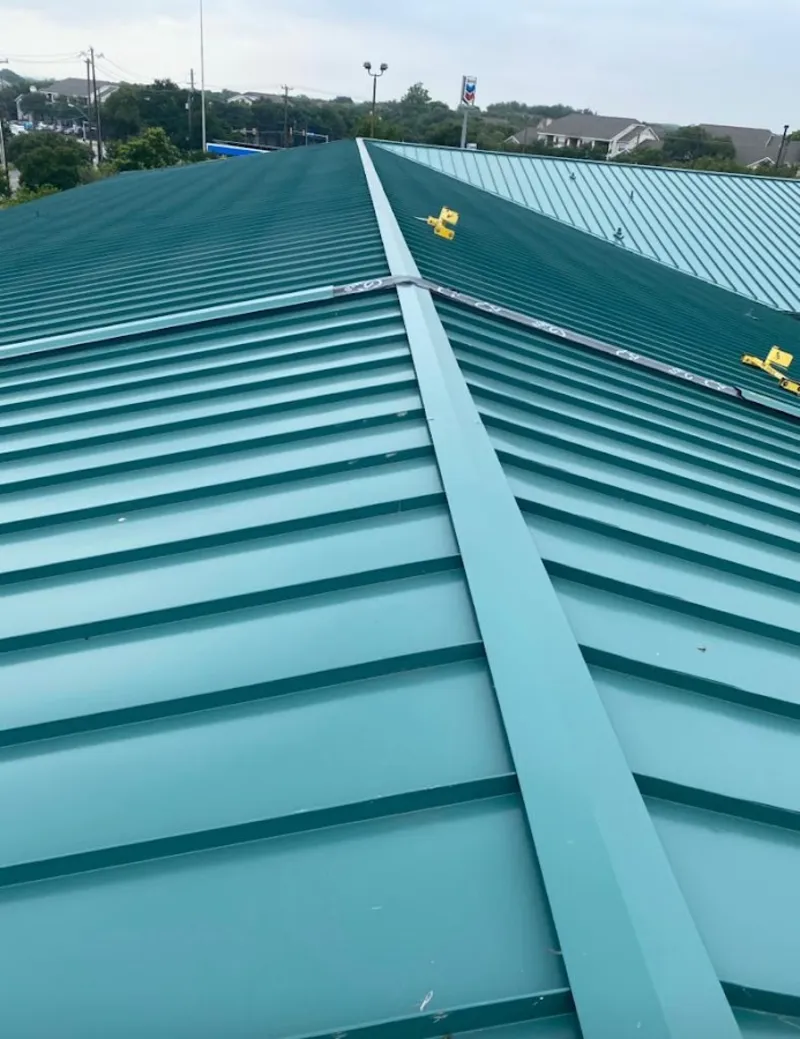 Green commercial metal roof ridge and valley for Metal Roof Repair in Johnstown